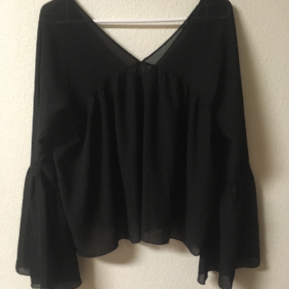 Bell sleeve flirty top